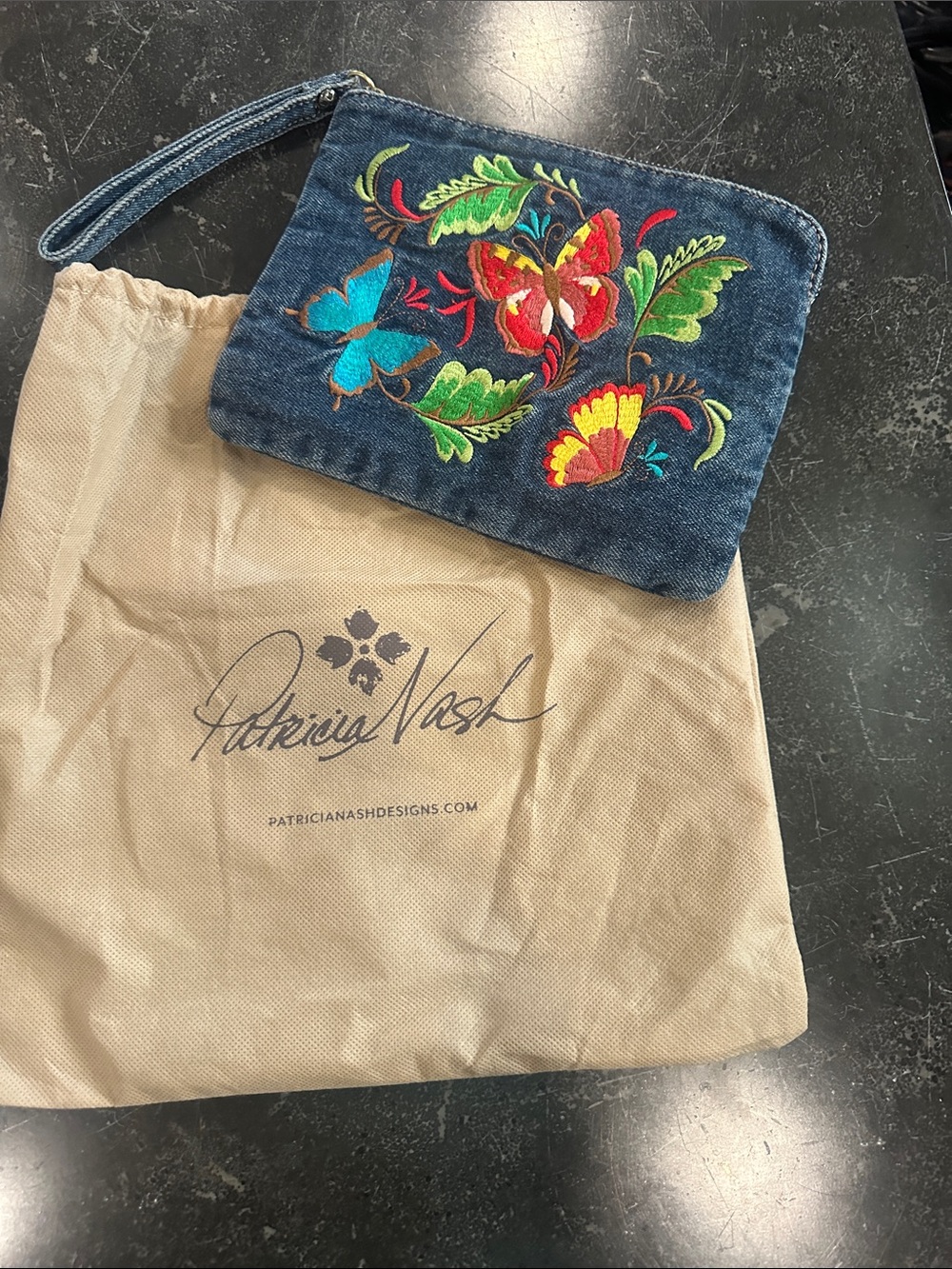 Patricia Nash Denim Wristlet with Multicolor Floral Embroidery